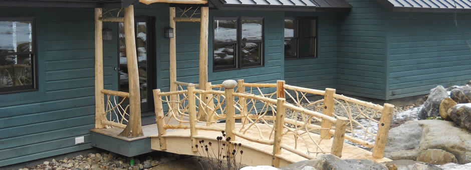 Custom built bridge to a home construction by G & L Contacting.